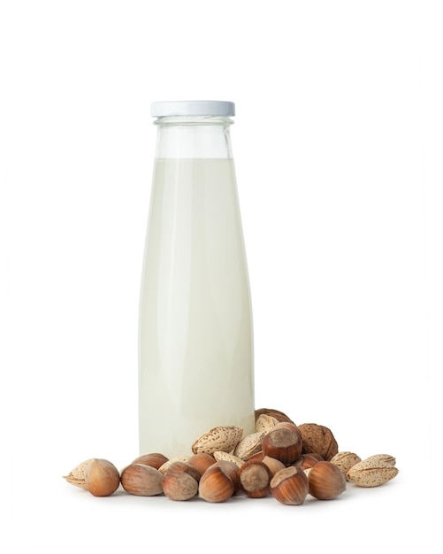 Nut milk bottle on white isolated background