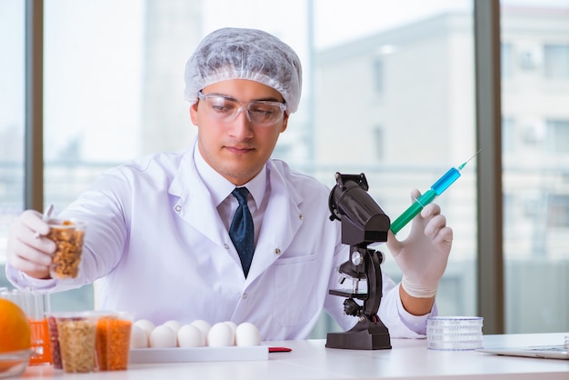 Nutrition expert testing food products in lab