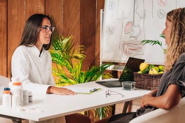 Nutritionist Advising a Client