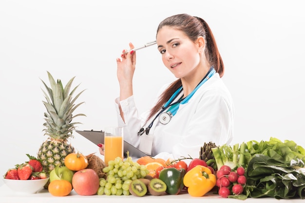 Nutritionist doctor woman. Isolated on white