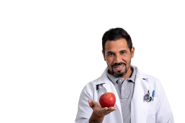 nutritionist, man holds apple, smiling at the camera. healthy eating, correct nutrition concept