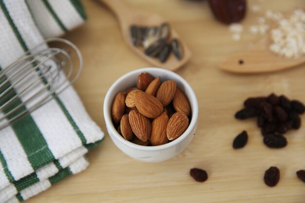 Nuts almond on wood background