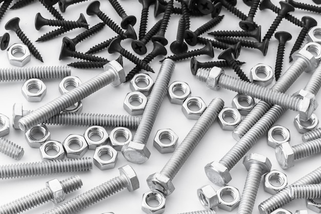 Nuts Bolts Screws closeup on white background