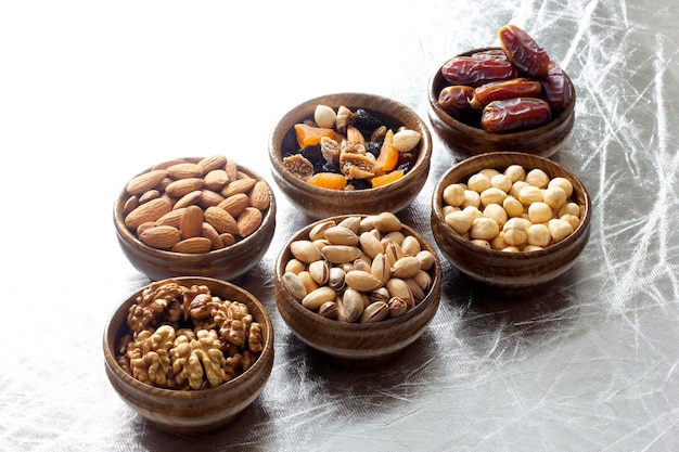 Nuts and dried fruits in bamboo plates