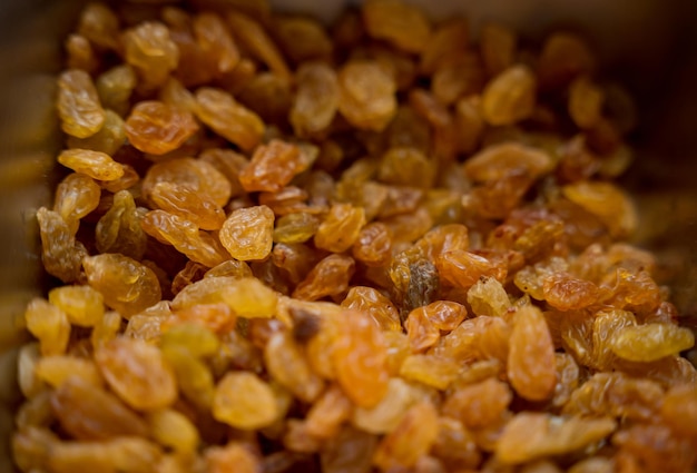 Nuts and dried fruits for making handmade chocolates and candies in a workshop