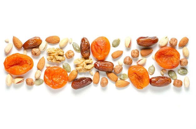 Nuts and dried fruits on white