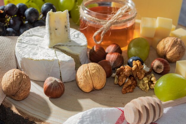 Nuts and a jar of honey closeup