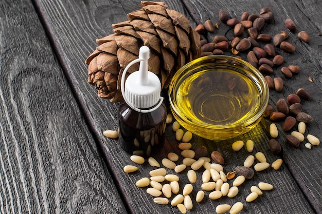 Nuts seeds cone and oil of Siberian pine