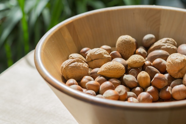 Nuts in wooden bowl.