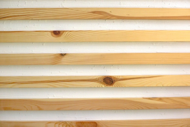 Oak bars on a white wall