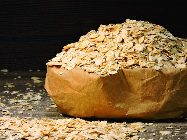 Oat flakes in a paper bag.