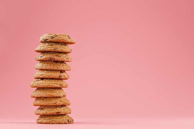 Oatmeal cookies stacked on a pink background