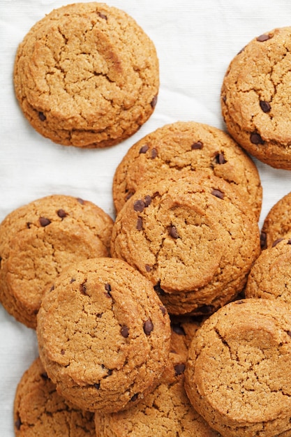 Oatmeal cookies on a white napkin top view. close-up