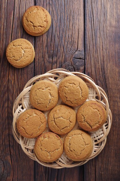 Oatmeal cookies on a wicker wooden plate