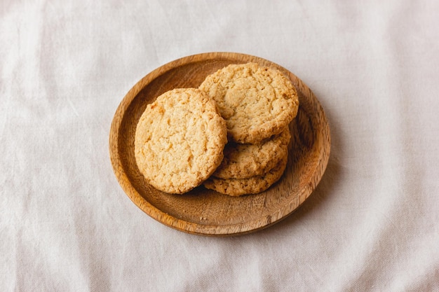 Oatmeal cookies on a wooden plate