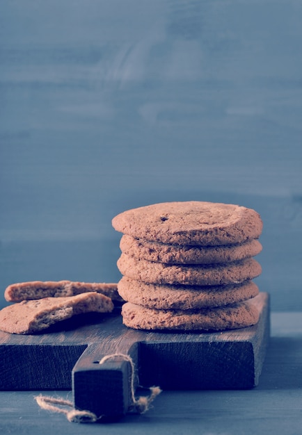 Oatmeal cookies on a wooden rustic Board