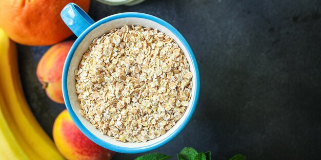 Oatmeal in a cup and fruits