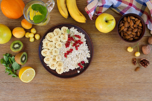 Oatmeal and fruit on the table