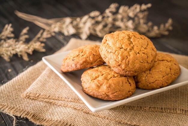 oatmeal raisin cookies on wood