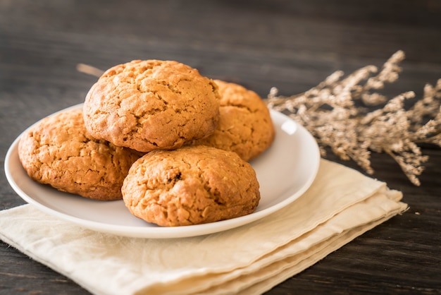 oatmeal raisin cookies on wood