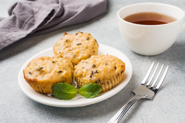 Oatmeal vegetarian muffins with blueberries and nuts on a plate