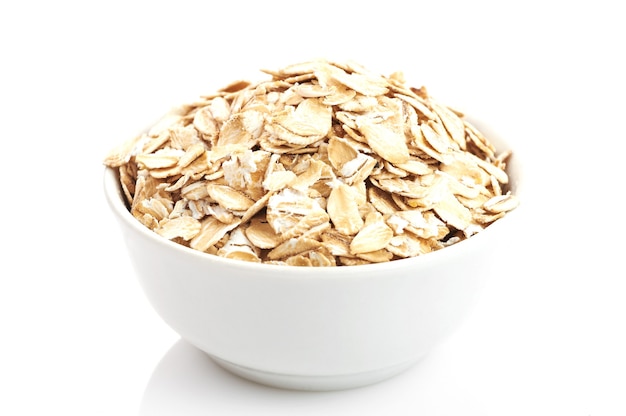 Photo oatmeal on white background