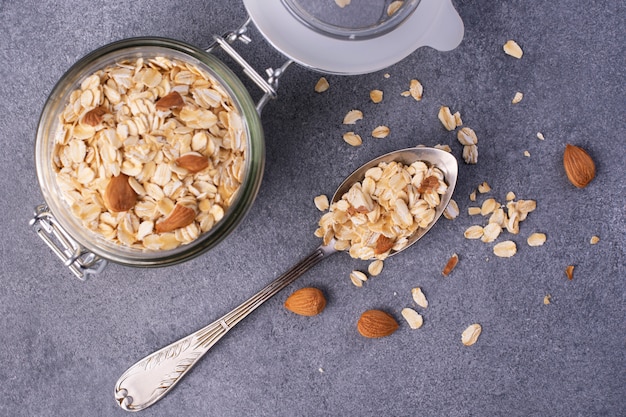 Oatmeal with almonds. Healthy eating concept. Top view.