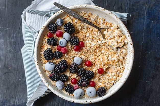 Oatmeal with berries in a plate delicious breakfast