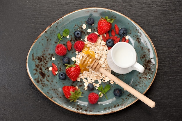 Oatmeal with berries top view