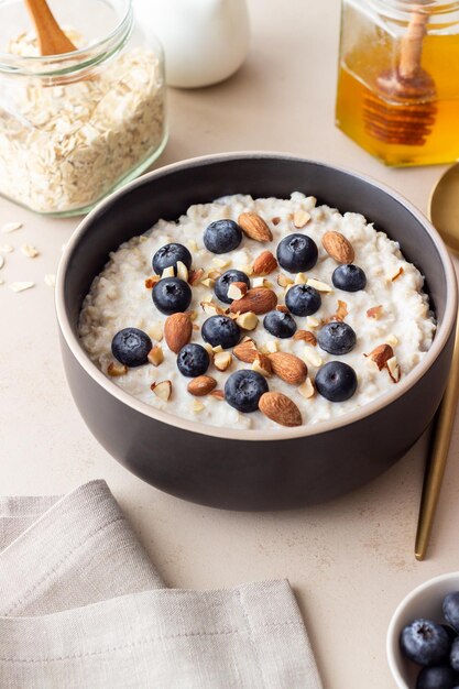 Oatmeal with blueberries almonds and honey Healthy food Vegetarian food Breakfast