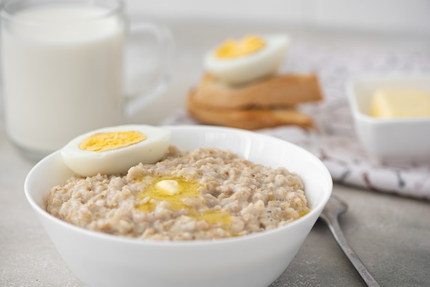 Oatmeal with butter and boiled egg