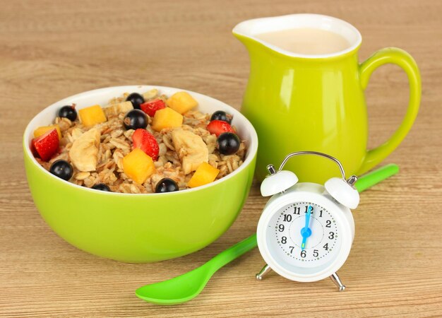 Oatmeal with fruits on table closeup