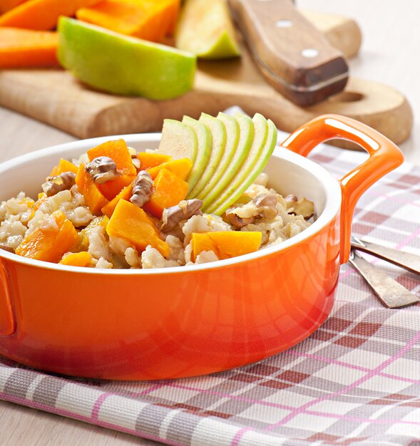 Oatmeal with pumpkin, apples, nuts and honey