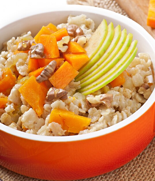 Oatmeal with pumpkin, apples, nuts and honey