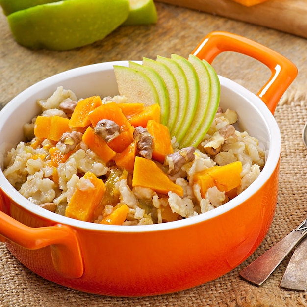 Oatmeal with pumpkin, apples, nuts and honey