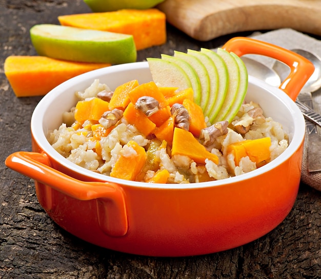 Oatmeal with pumpkin, apples, nuts and honey