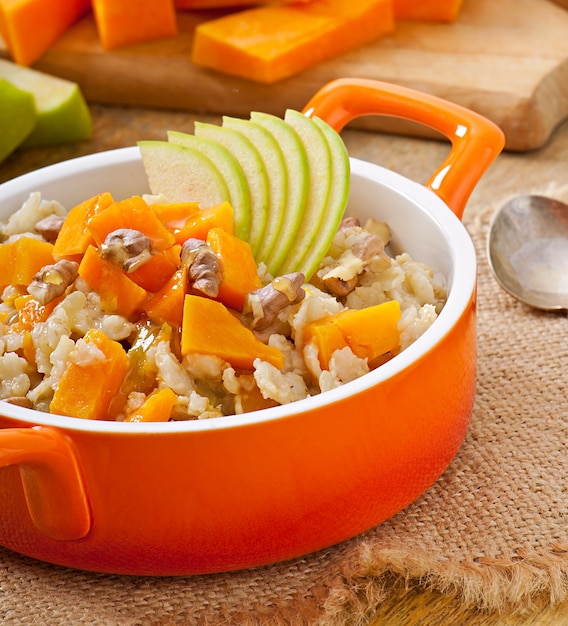 Oatmeal with pumpkin, apples, nuts and honey