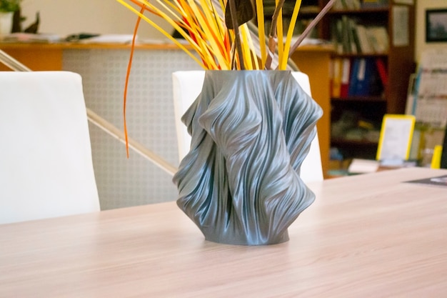 The object printed on the 3d printer stands on the table