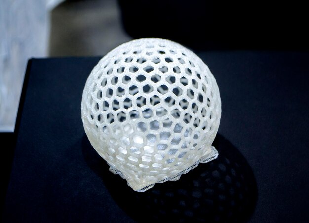 Object prototype printed on d printer from plastic filament closeup modern new prototyping technolog