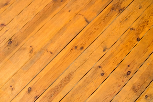 Obliquely texture of yellow nature wooden boards