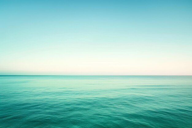 Photo the ocean is calm and blue with no visible waves