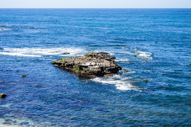 Ocean view of crashing waves in southern California west coast