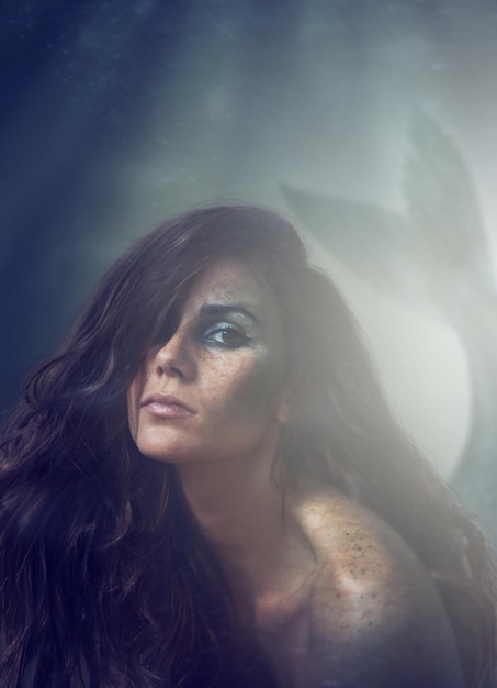 Oceans daughter A cropped portrait of a beautiful mermaid ALL design on this image is created from scratch by Yuri Arcurs team of professionals for this particular photo shoot