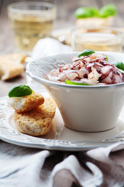 Octopus carpaccio in the table