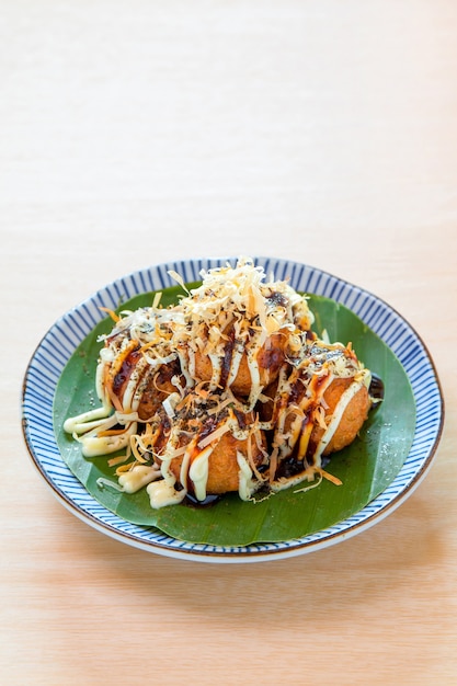 Octopus dumplings on wooden table