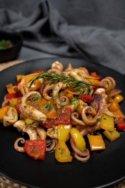 Octopus salad with herb vegetables Fresh and healthy salad seafood squid octopus tentacles Mediterranean food