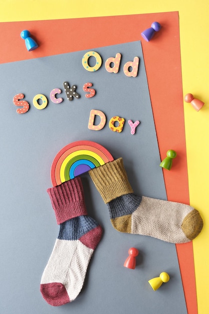 Odd Socks Day text Initiative against bullying by Antibullying alliance on November 16 Celebrate that day by wearing mismatched socks to school or workplace