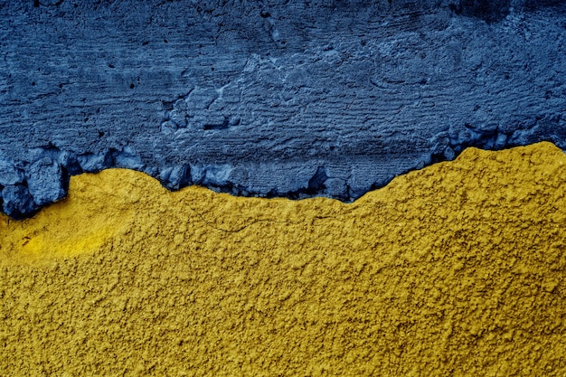 Oekraïense vlag op getextureerde muur Poetin-invasie Oorlog tegen Oekraïne