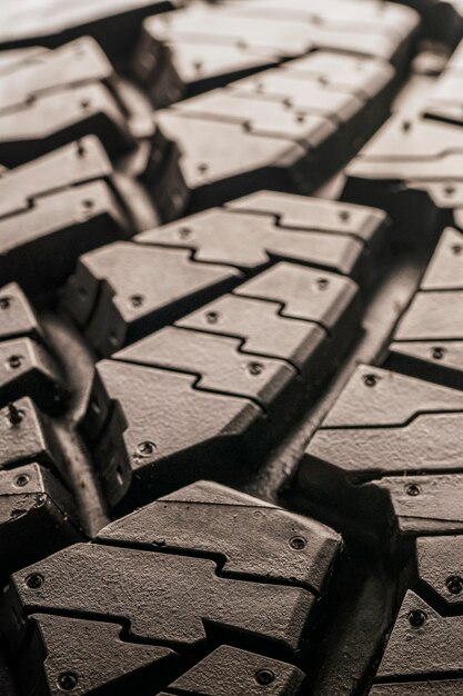 Off-road all terrain tire tread close-up. Powerful ground hooks.