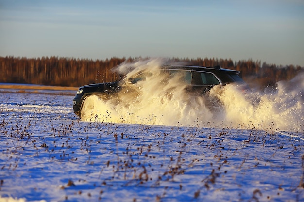 off-road vehicle drift in the snow field adventure winter speed nature